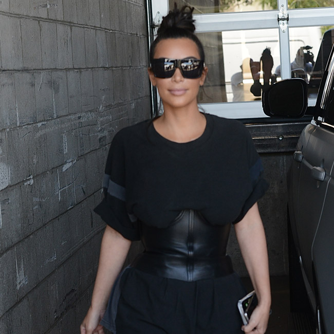 Kim Kardashian wears all black as she heads to studio ti film KUWTK in Los Angeles Pictured: Kim Kardashian Ref: SPL1321443 190716 Picture by: Aficionado Group / Splash News Splash News and Pictures Los Angeles:310-821-2666 New York: 212-619-2666 London: 870-934-2666 photodesk@splashnews.com 