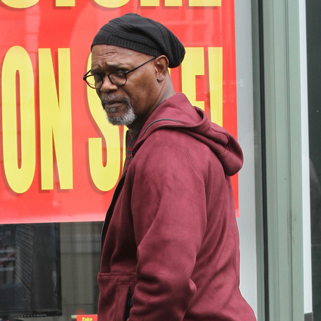 163414, Samuel L. Jackson, dressed all in burgundy, enjoys a quick vape between takes as he films Life Itself in Manhattan's West Village. New York City, NY - Tuesday March 28, 2017. Photograph: © LGjr-RG, PacificCoastNews. Los Angeles Office (PCN): +1 310.822.0419 UK Office (Avalon): +44 (0) 20 7421 6000