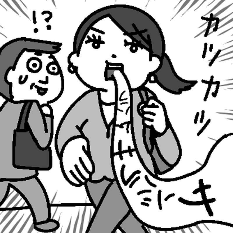 呟きながら歩く女性