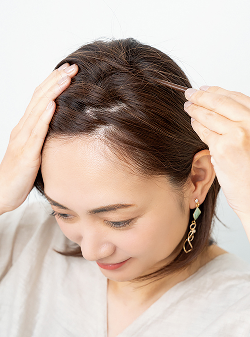分け目を変えて薄毛の進行を予防