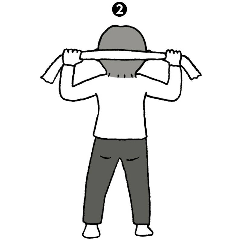 引っ張ったまま両ひじを曲げ、肩甲骨を引きつける