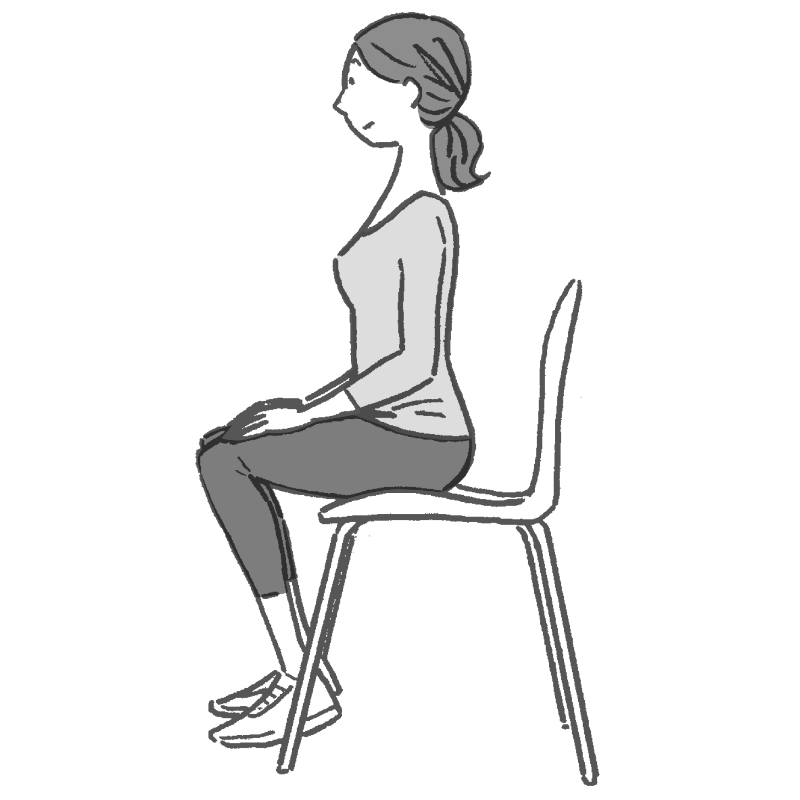 いすに座る女性