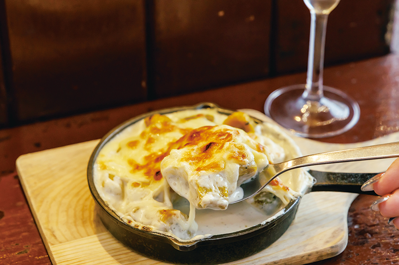 むっちりとした食感の手作りニョッキをグラタンスタイルで味わえる「かぼちゃのニョッキ」800円。